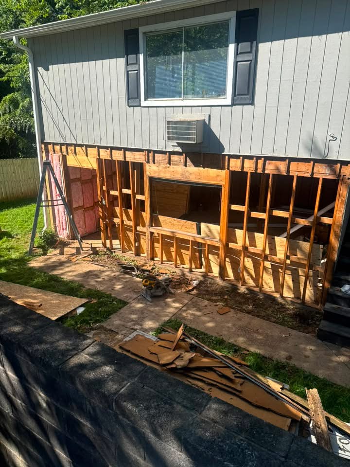 Wall framing and header work during a remodel